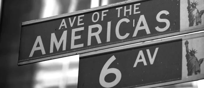Street sign for Avenue of the Americas / 6th Ave.