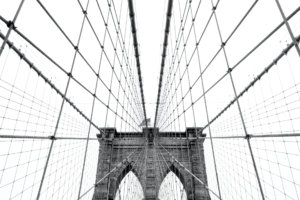 black and white artistic photo of Brooklyn bridge in new york city