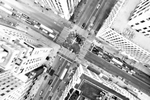 black and white aerial photo of city streets in new york city
